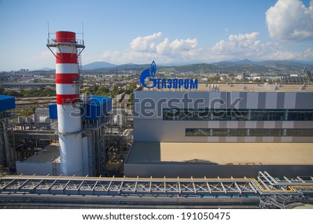 ADLER, RUSSIA - JUNE 26, 2013: Gazprom company logo on the roof of thermal power plant.