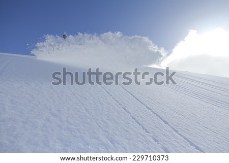 spray snow, freeride in the winter mountains