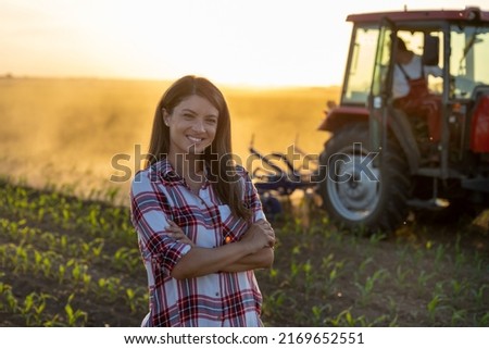 Similar – Image, Stock Photo Female farmer with tractor on olive plantation
