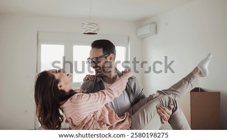 Similar – Image, Stock Photo Young man lifts his bike