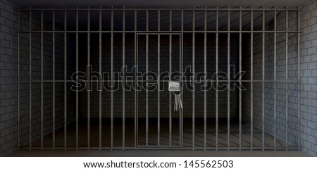 A full view of a prison holding cell consisting of a brick and concrete room enclosed with metal bars and a closed door with a bunch of keys in it