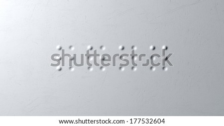A closeup concept of a set of four isolated braille letters spelling out the word read on a textured white paper