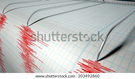 A closeup of a seismograph machine needle drawing a red line on graph paper depicting seismic and earthquake activity on an isolated white background
