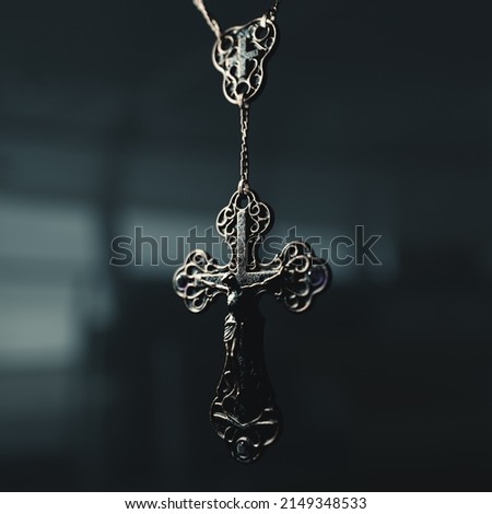 Image, Stock Photo A rosary hangs from an open Christian prayer book with the Our Father