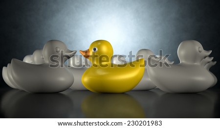 A non-conformist depiction of a yellow rubber bath duck swimming against the flow of a group of grey rubber ducks on a dark backlit background
