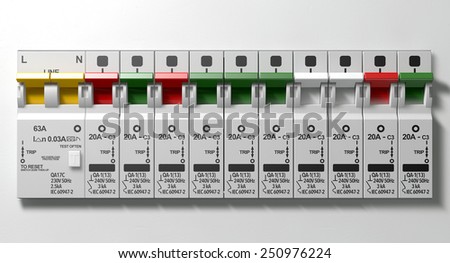 A row of switched on household electrical circuit breakers on a wall panel