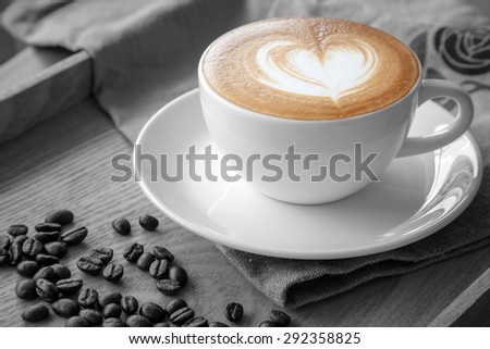 Heart in a cup of cafe\' latte