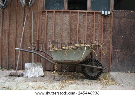 Wheelbarrow and farm tool at a farm