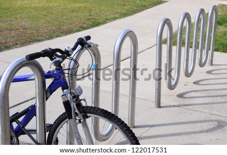 a bike at bike rack in campus