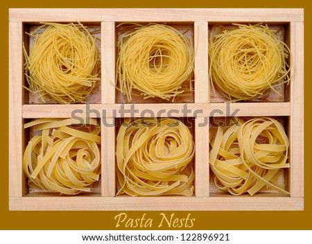 Two kind of pasta nests in wooden box