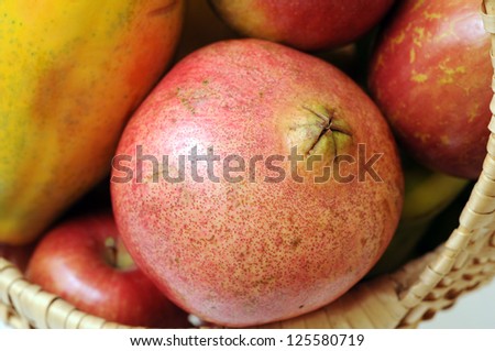 closeup of pomegranate in basket