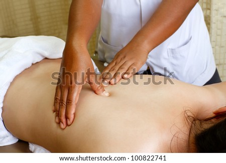 Pretty asia women enjoy relaxing in the spa salon , spa body reflexology massage
