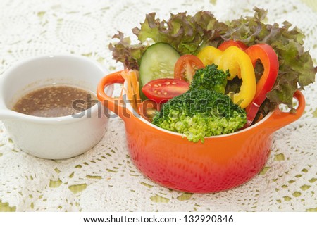 mix healthy salad and salad dressing