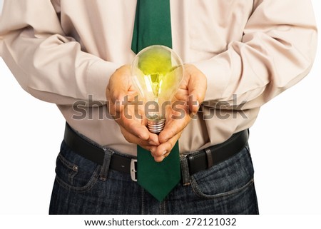 Business holding a light bulb  meaning he having good idea for project