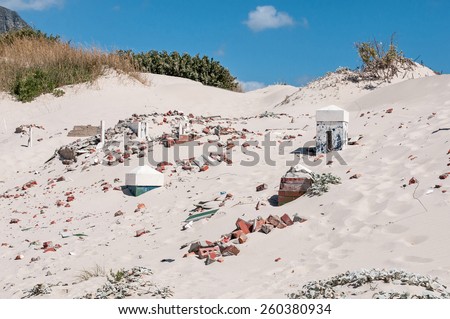 CAPE TOWN, SOUTH AFRICA- DECEMBER 12, 2014: Old police station at Hout Bay reclaimed by sand dunes, Cape Town, South Africa.