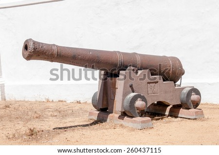 STELLENBOSCH, SOUTH AFRICA- DECEMBER 18, 2014: Rusty old cannon at the historic Powder Magazine in Stellenbosch in the Western Cape Province of South Africa