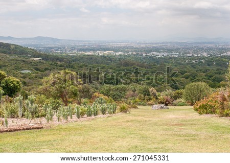 CAPE TOWN, SOUTH AFRICA - DECEMBER 9, 2014: View from Kirstenbosch National Botanical Gardens towards Newlands and Claremont. Newlands Rugby and Cricket Stadiums are visible