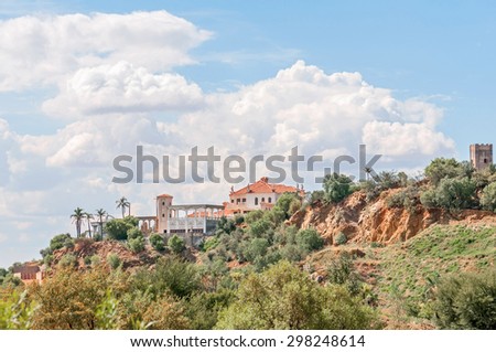 BLOEMFONTEIN, SOUTH AFRICA - JANUARY 15, 2012: A luxury home on a hill in Bloemfontein, reminiscent of a castle.