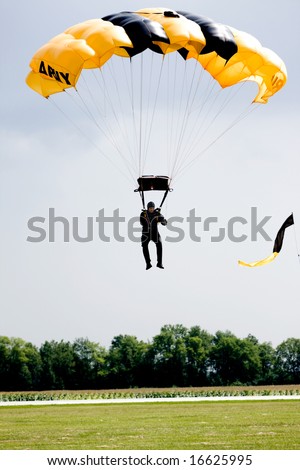 INDIANAPOLIS - AUGUST 24: A member of the Golden Knights Parachute team attempts to land at the Indy air show on August 24, 2008 in Indianapolis,Indiana