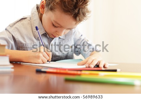 Similar – Image, Stock Photo Boy does homework