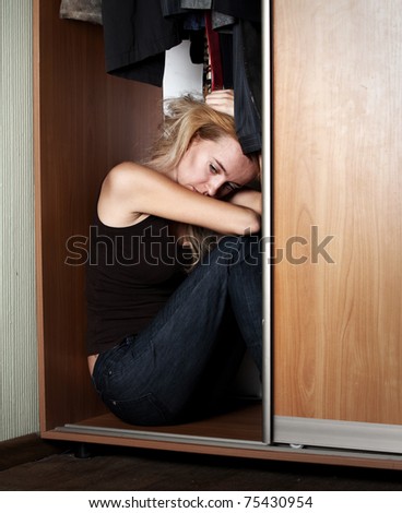 Sad Woman Sitting In The Closet Stock Photo 75430954 : Shutterstock