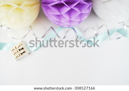 Colorful balls, party and glamour style, gold accessories. White background. yellow., gold, mint, table view woman