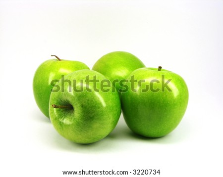 Four apples, laying together on a white background.