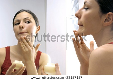 Woman in front of a mirror