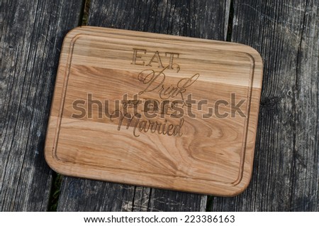 Engraved wood cutting board stated \