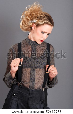 blond woman wearing black suspenders