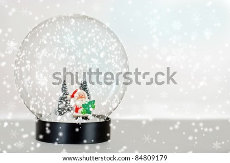 Santa snow globe with falling snow