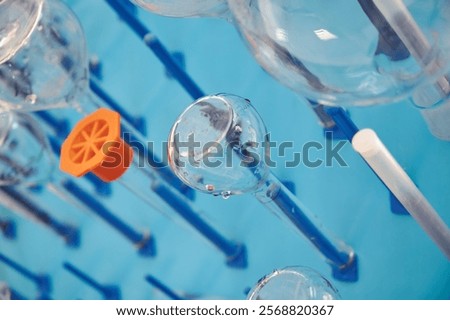 Image, Stock Photo Various glassware on orange table