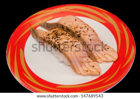 roasted salmon sushi with garlic, low fat traditional japanese food for good health