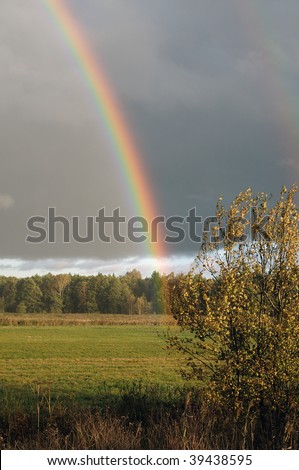 Bright rainbow after an autumn thunder-storm
