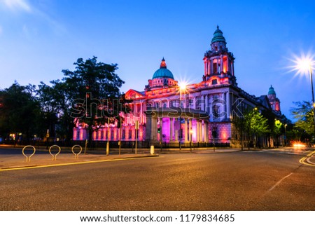 Belfast, UK. Nightlife with illuminated city hall in Belfast, UK the capital of Northern Ireland at night with dark sky