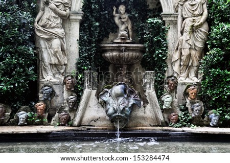 PUBOL, SPAIN - JULY 10: Fountain of Richard Wagner at garden of Dali-Gala Castle Museum-House in Pubol, Spain at July 3, 2013. It was the home to surrealist painter Salvador Dali and his wife Gala
