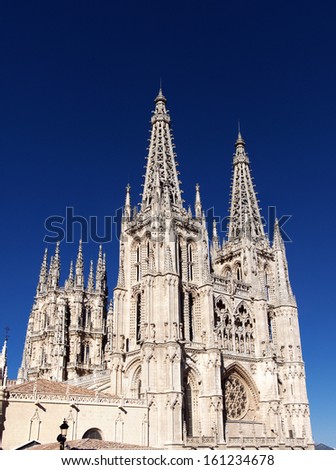 Facade of Gothic-style Roman Catholic Cathedral in Burgos, Castile and Leon, Spain. It\'s popular tourist attraction, famous for the architecture style and size, declared a UNESCO World Heritage Site.