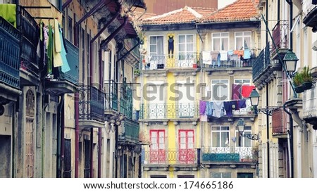 Colorful old houses of Porto, Portugal with hanging clothes