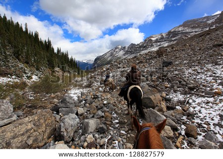 horseback riding in plain of six glaciers alberta canada