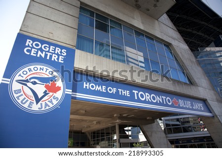 TORONTO- SEPTEMBER 15, 2014: Toronto Blue Jays baseball team logo as displayed on a banner outside of Rogers Centre in Toronto.
