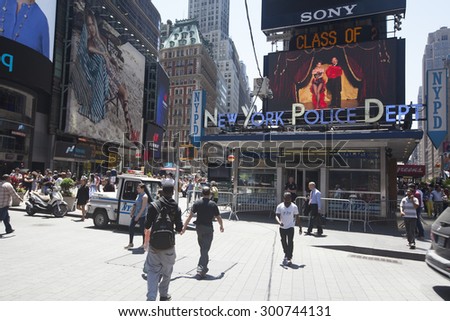NEW YORK - May 29, 2015: Times Square busy with people and tourists. More than 300 thousand people visit this square every day.