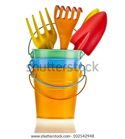 Colorful gardening tools over white background