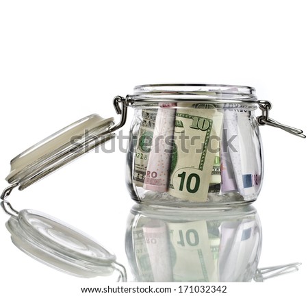 Money jar full of savings  isolated on white background