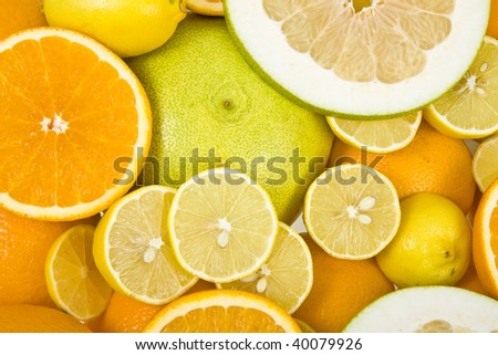 citrus fruits mix surface close up top view  background