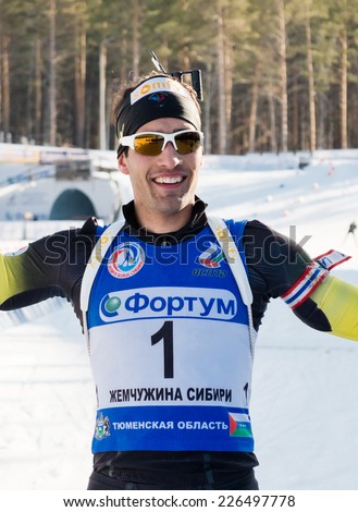 Tyumen, RUSSIA - APR 9, 2014: Martin Fourcade (FRA) after finish at Biathlon Men\'s 18 km Mega Mass start at International Biathlon Competition \