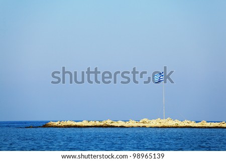 Rhodes flag in little island, taken in Rhodes island, Greece