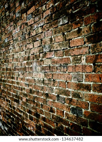 Brick wall with hooks