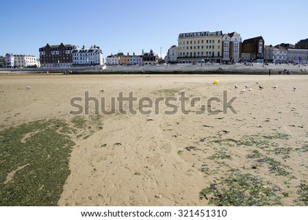 MARGATE, KENT, UK - AUGUST 8. 2015. English seaside town with old fashioned painted houses and shops located in the historic town of Margate, Kent, UK.