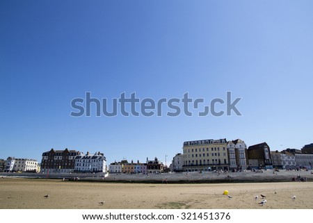 MARGATE, KENT, UK - AUGUST 8. 2015. English seaside town with old fashioned painted houses and shops located in the historic town of Margate, Kent, UK.