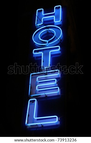 Blue neon hotel sign
